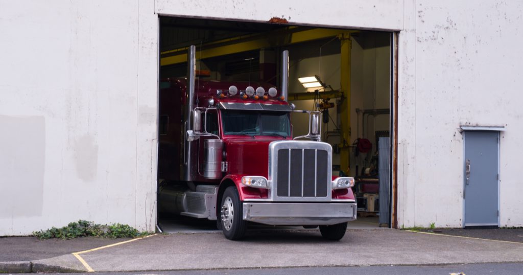 Trucker using TruckLogics trucking management system