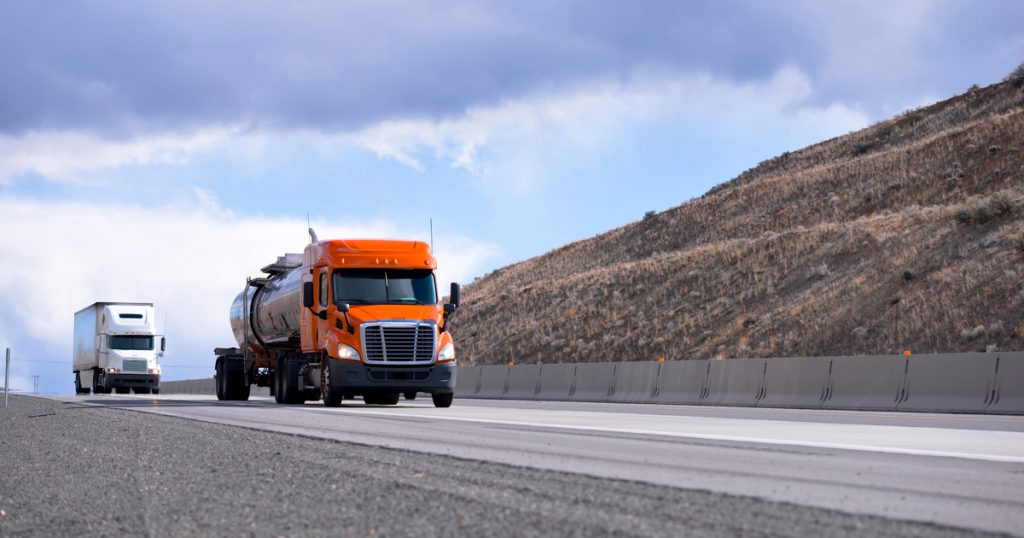 Truck on interstate using TruckLogics TMS for IFTA reporting