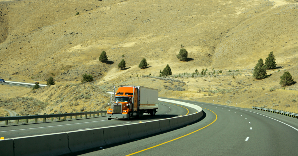 orange truck in hills mangaging truck maintenance schedules